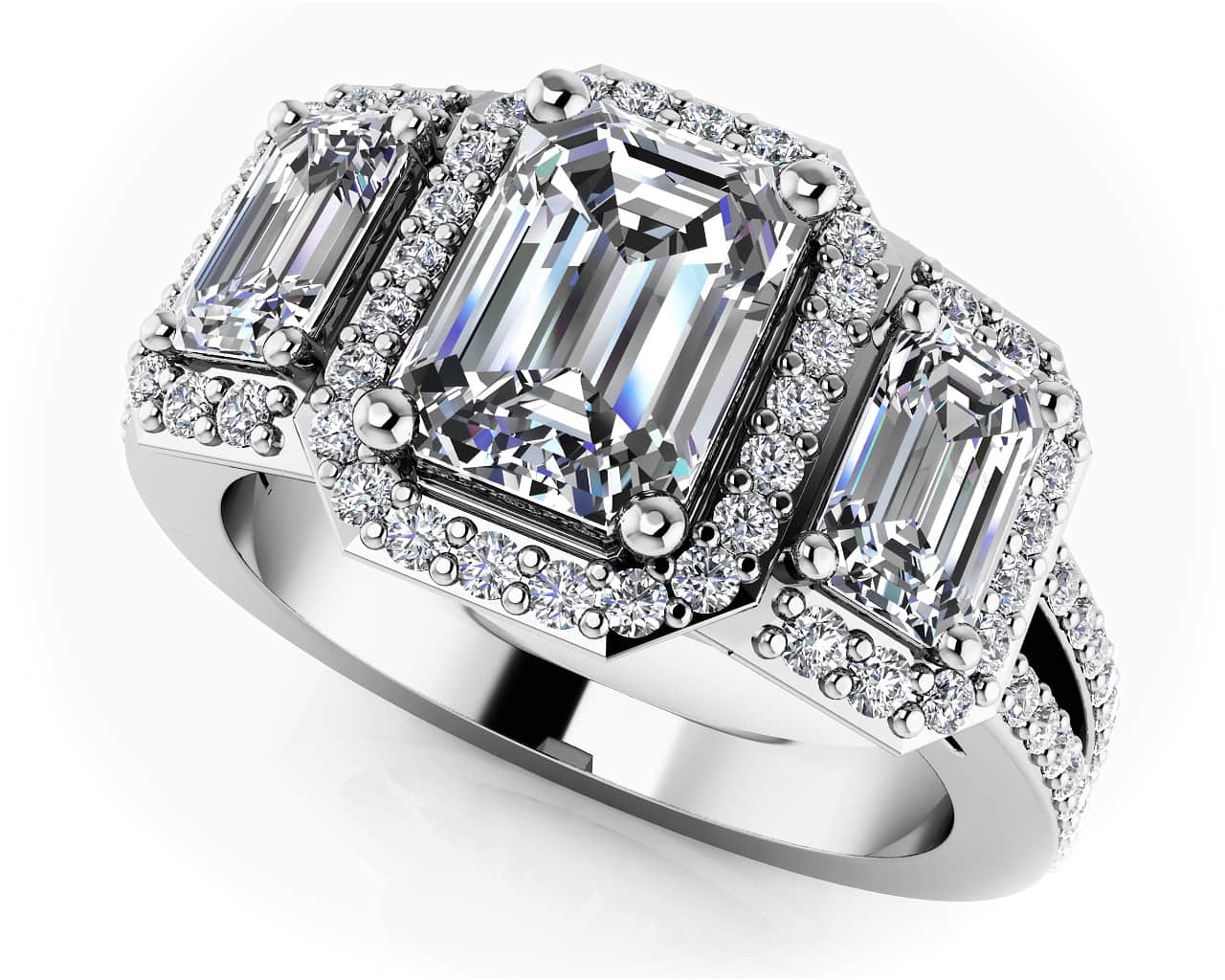 Three Stone Emerald Diamond And Halo Surround Ring In Platinum Or Gold