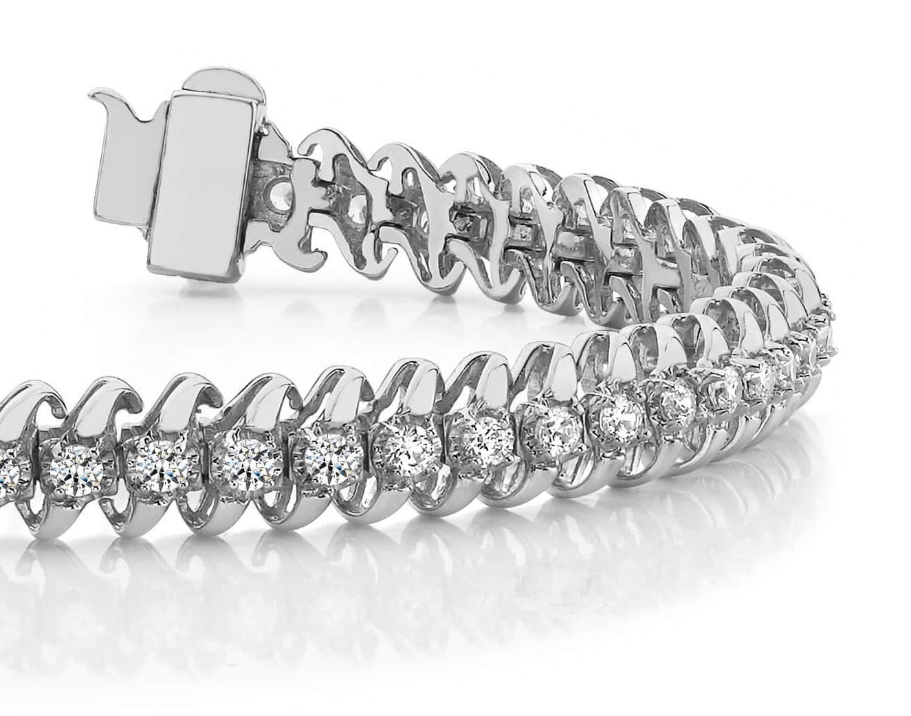 Emerald Cut Diamond White Gold Tennis Bracelet Illusion Set For Sale at  1stDibs | illusion emerald cut diamond, emerald cut tennis bracelet,  emerald cut bracelet